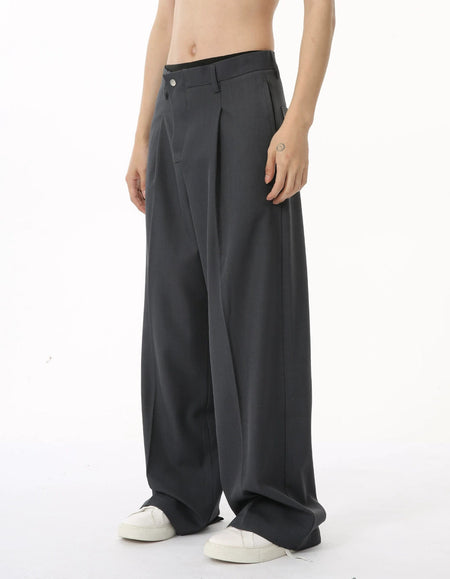 Wide Leg Pleated Trousers with Asymmetric Button Closure