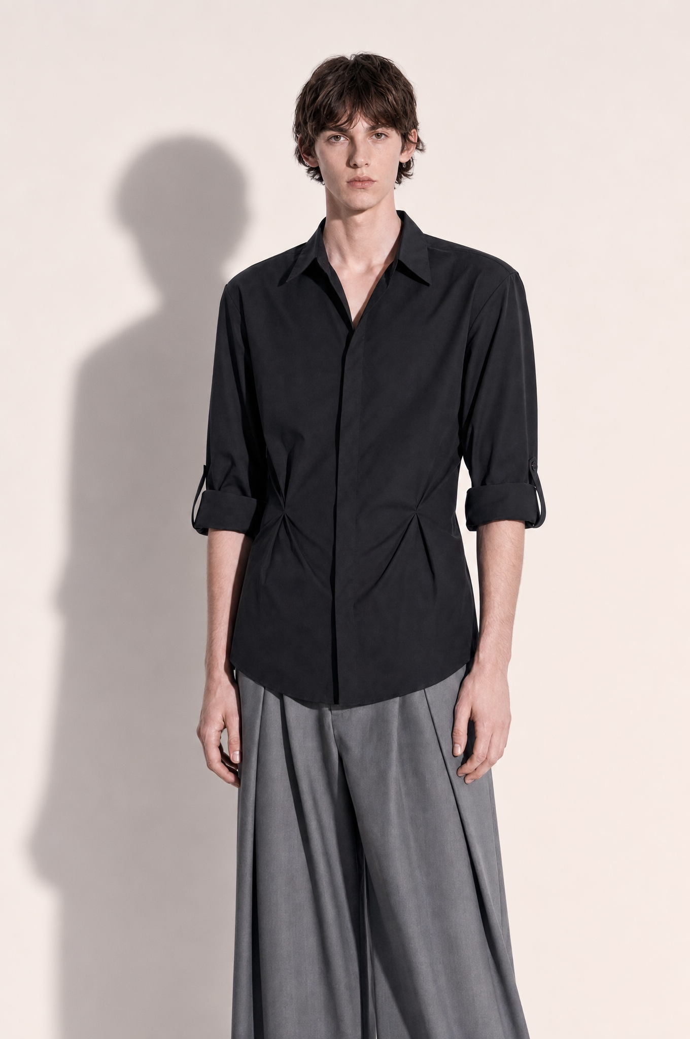 Tapered Waist Structured Shoulder Shirt in black, front three-quarter length view
