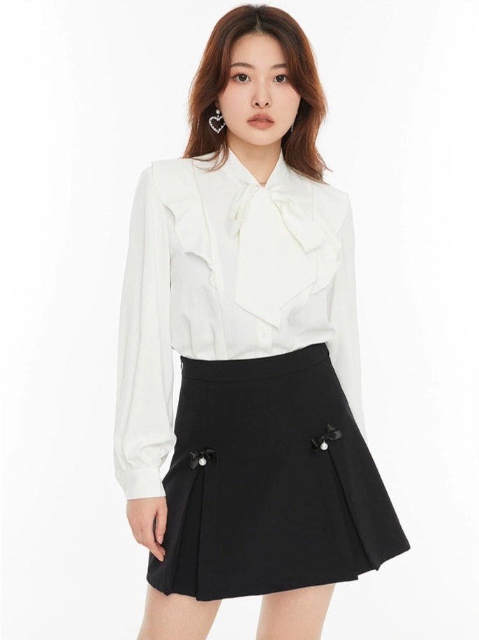 Pleated Mini Skirt with Bow and Faux Pearl Accents