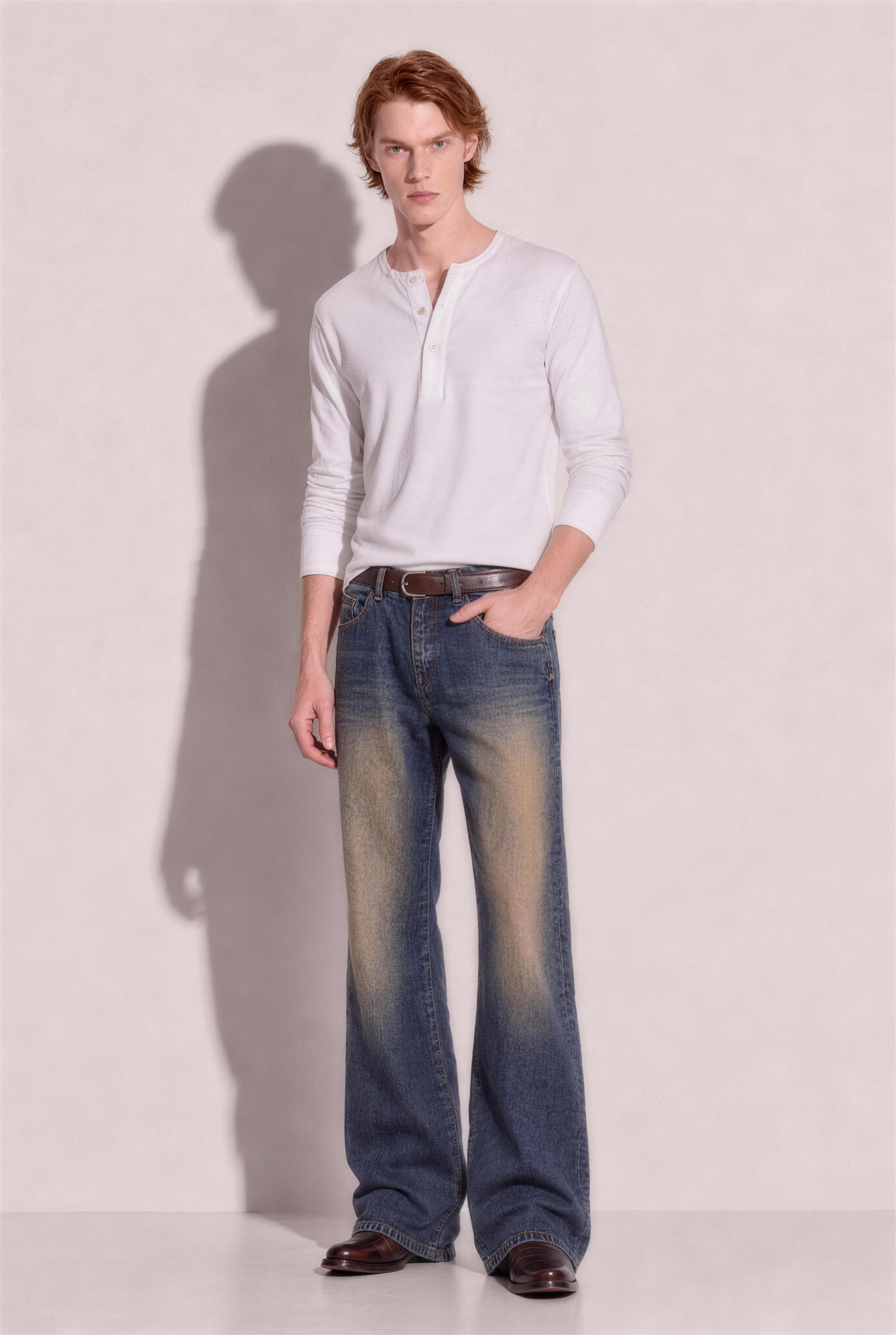Western Vintage Wash Bootcut Denim Jeans in Rusty Iron – three-quarter view