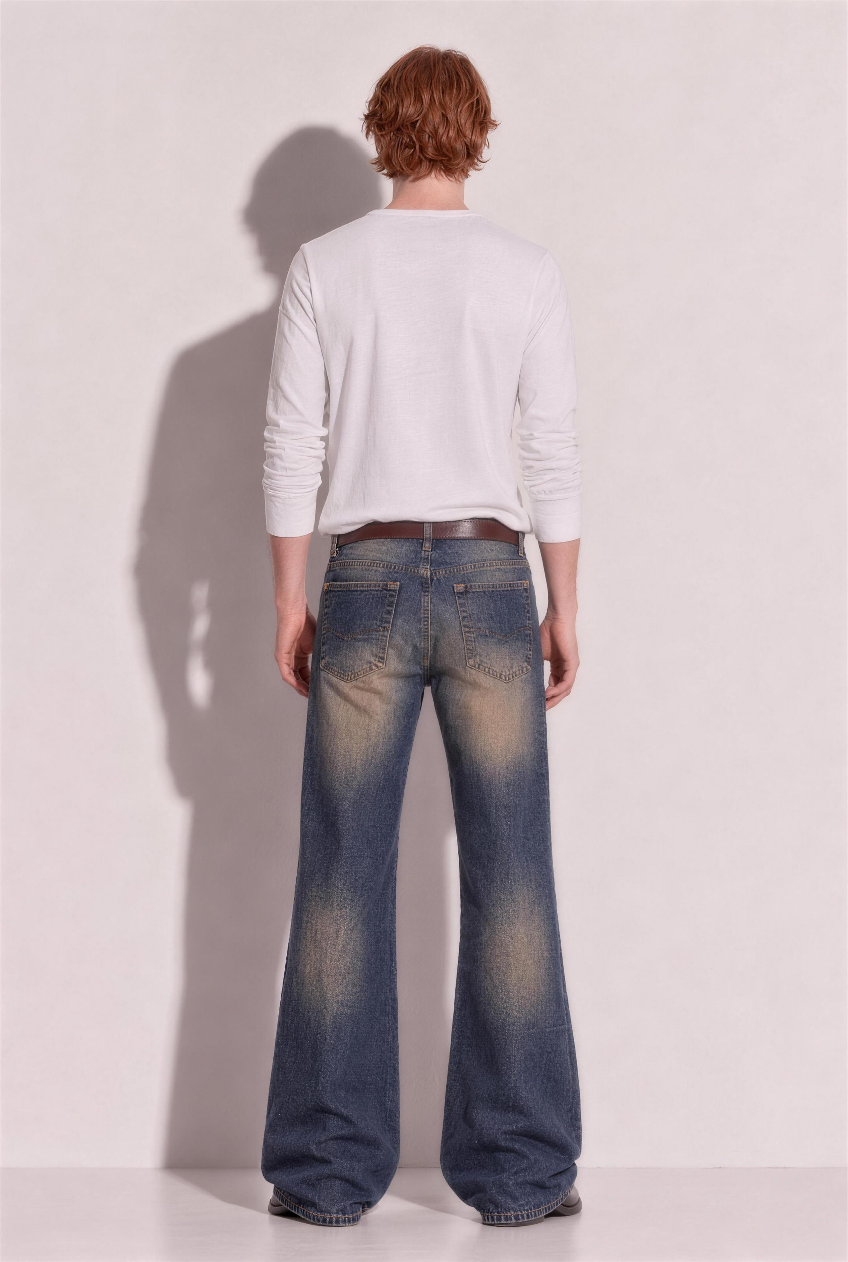 Western Vintage Wash Bootcut Denim Jeans in Rusty Iron – back view