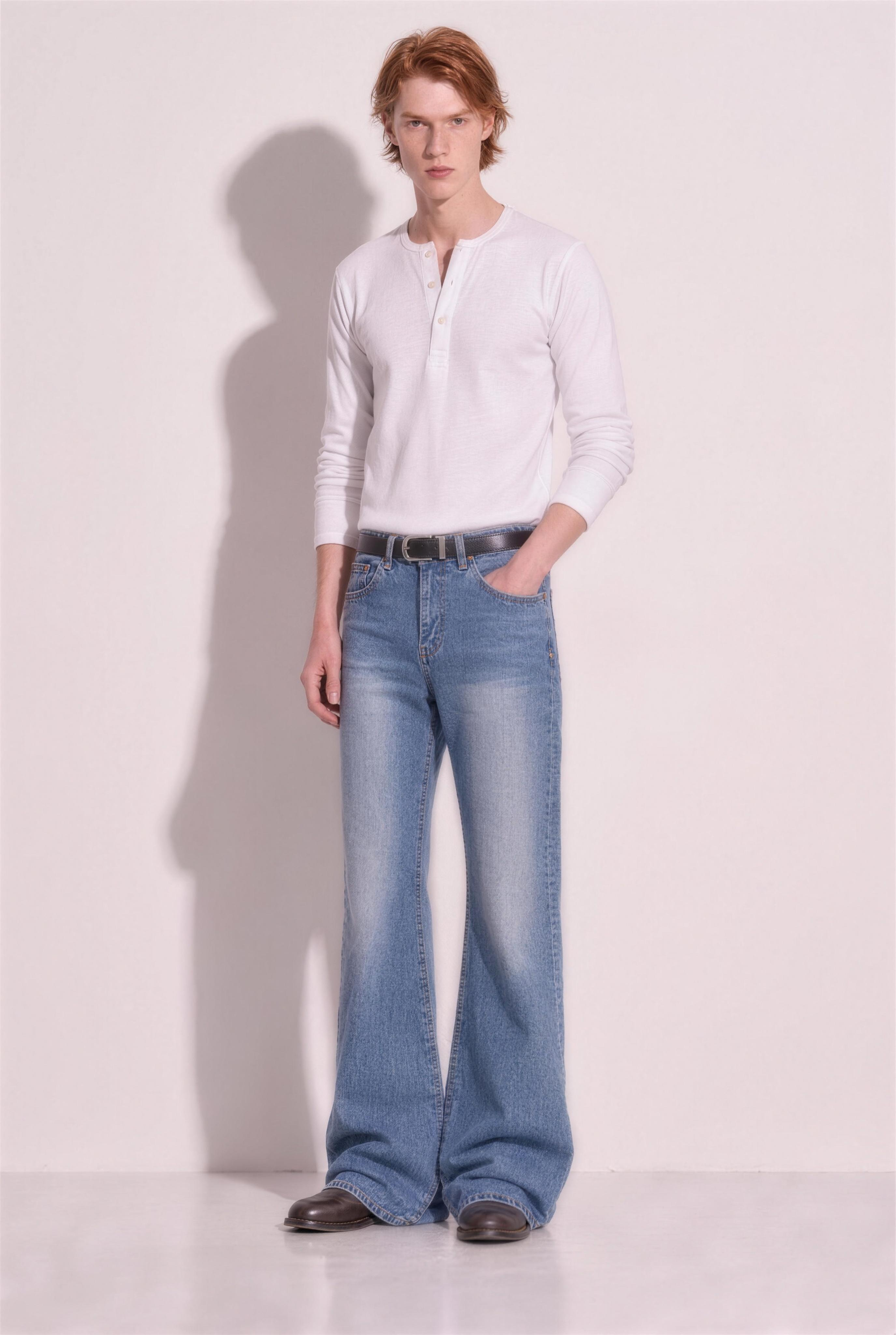 Western Vintage Wash Bootcut Denim Jeans in Light Blue – three-quarter view