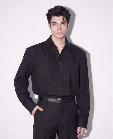 Boxy Pleated Front Pointed Collar Tuxedo Shirt in black - half body front view showing pleated bib and pointed collar