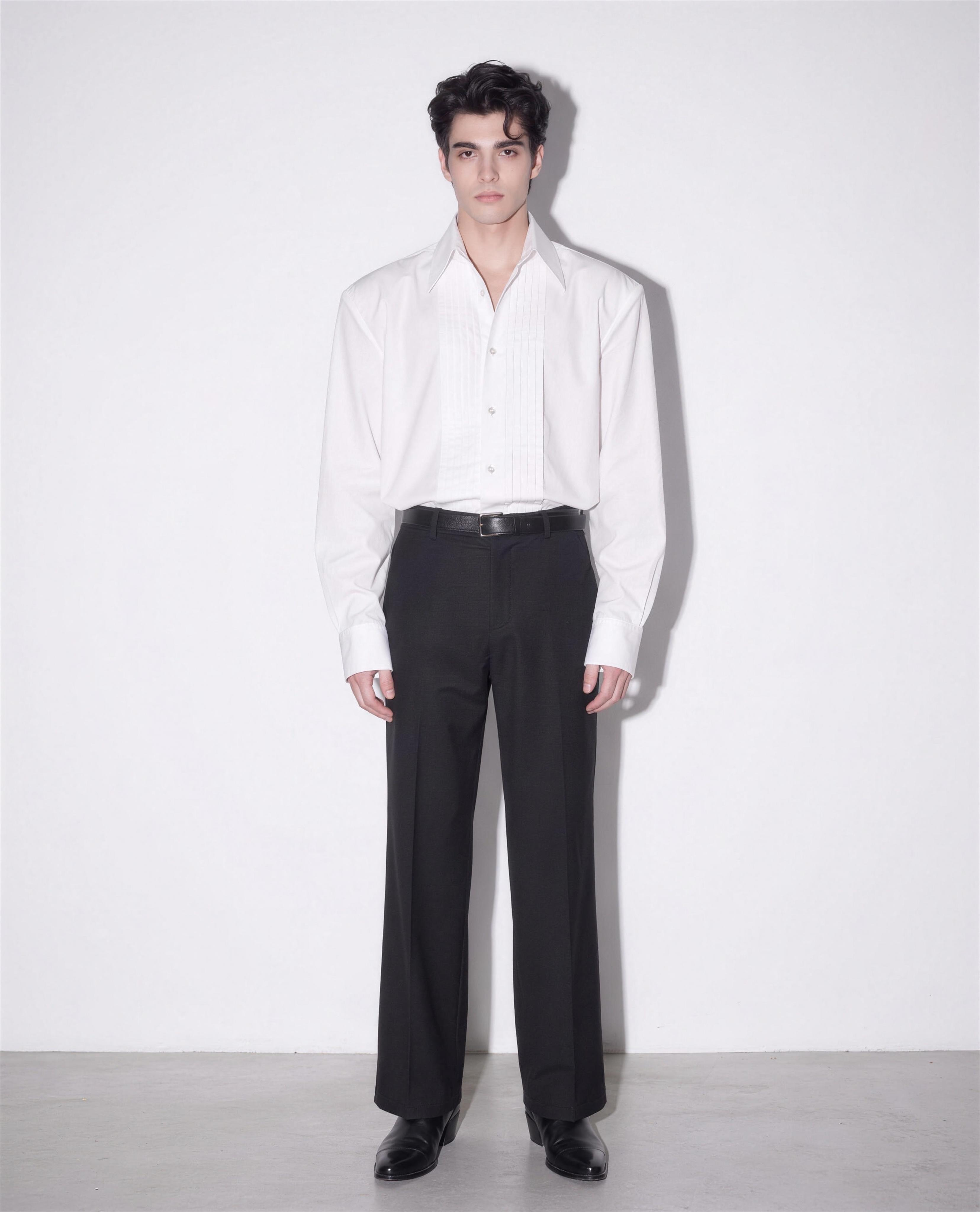 Boxy Pleated Front Pointed Collar Tuxedo Shirt in white styled with black wide-leg trousers - full body view