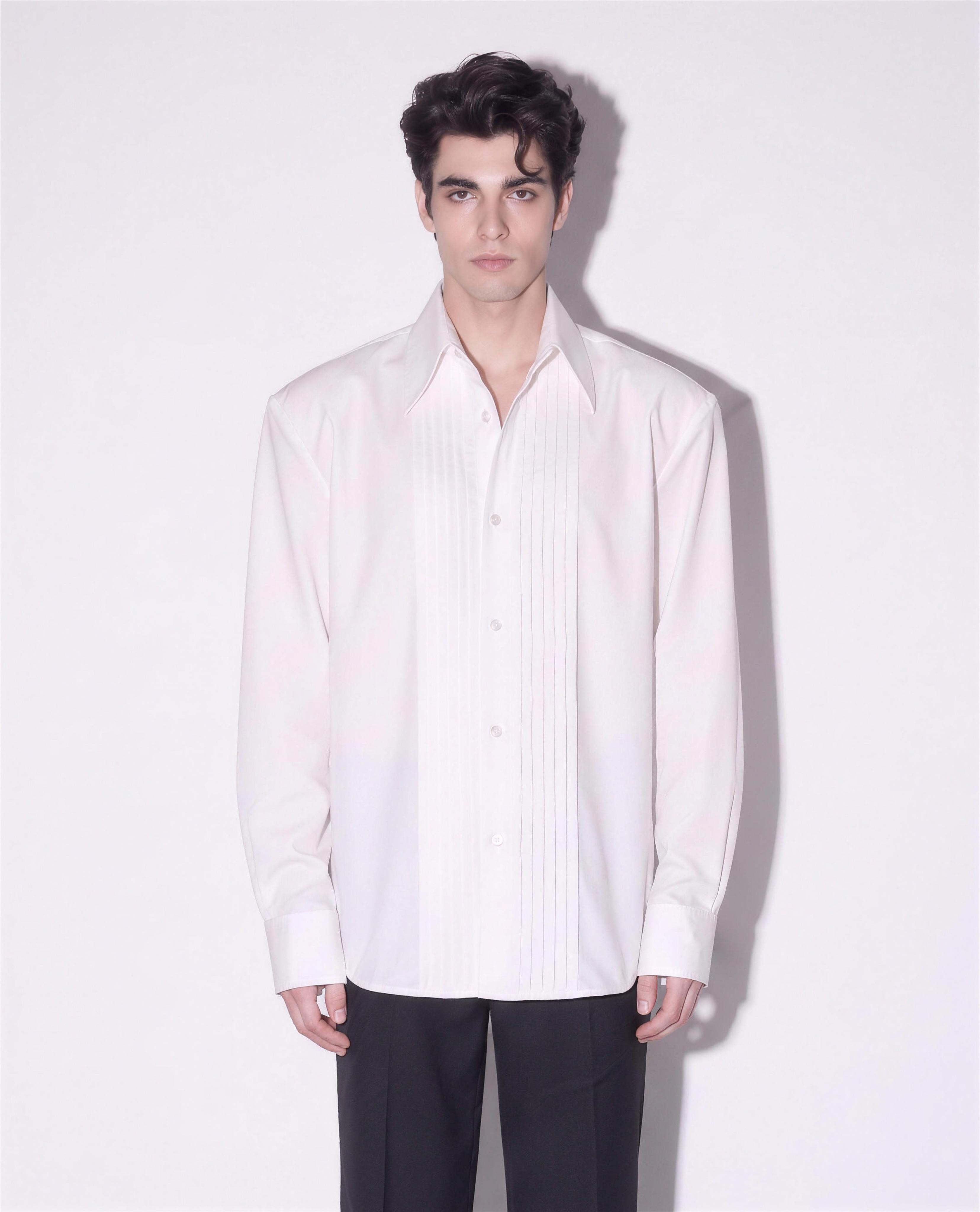 Boxy Pleated Front Pointed Collar Tuxedo Shirt in white worn untucked - half body view showing straight hem
