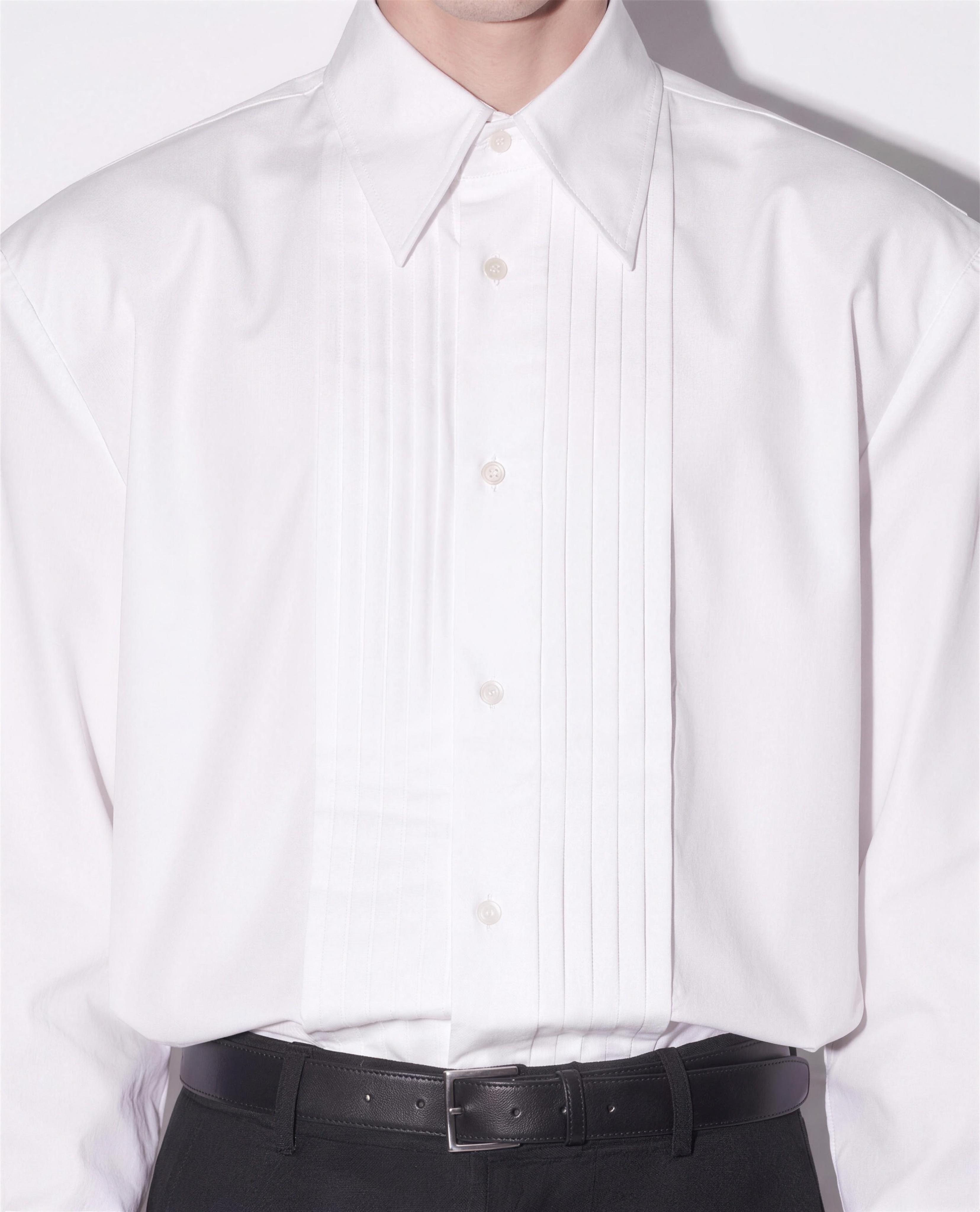 Boxy Pleated Front Pointed Collar Tuxedo Shirt in white - close up detail of vertical pleated front panel and pointed collar