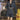 Houndstooth Cropped Blazer and Pleated Tier Hem Mini Skirt Two-Piece Set - nightcity clothing
